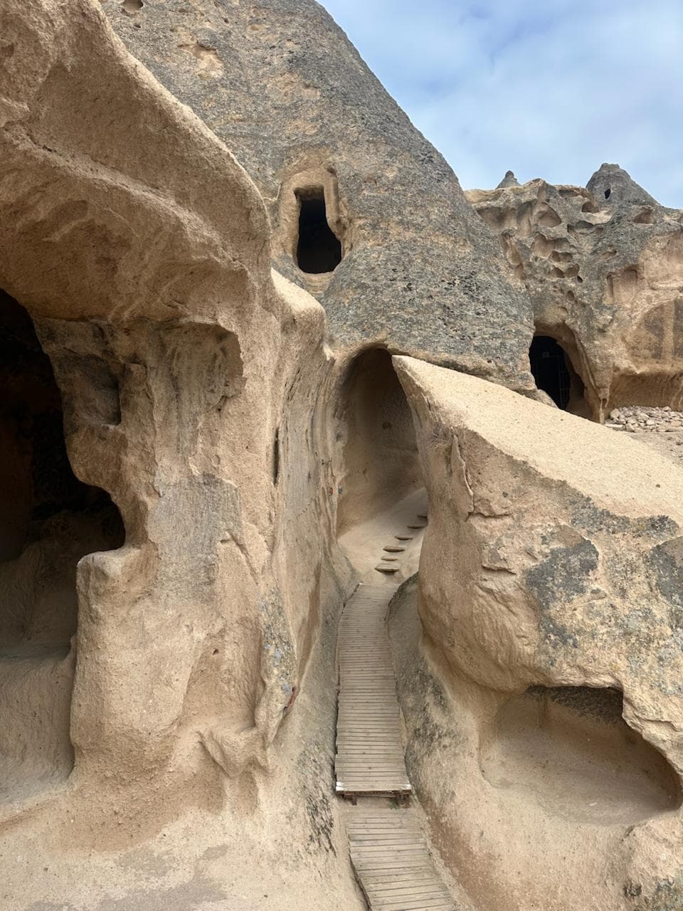 Ancient ventilation shaft and stone doors in Kaymakli Underground City
